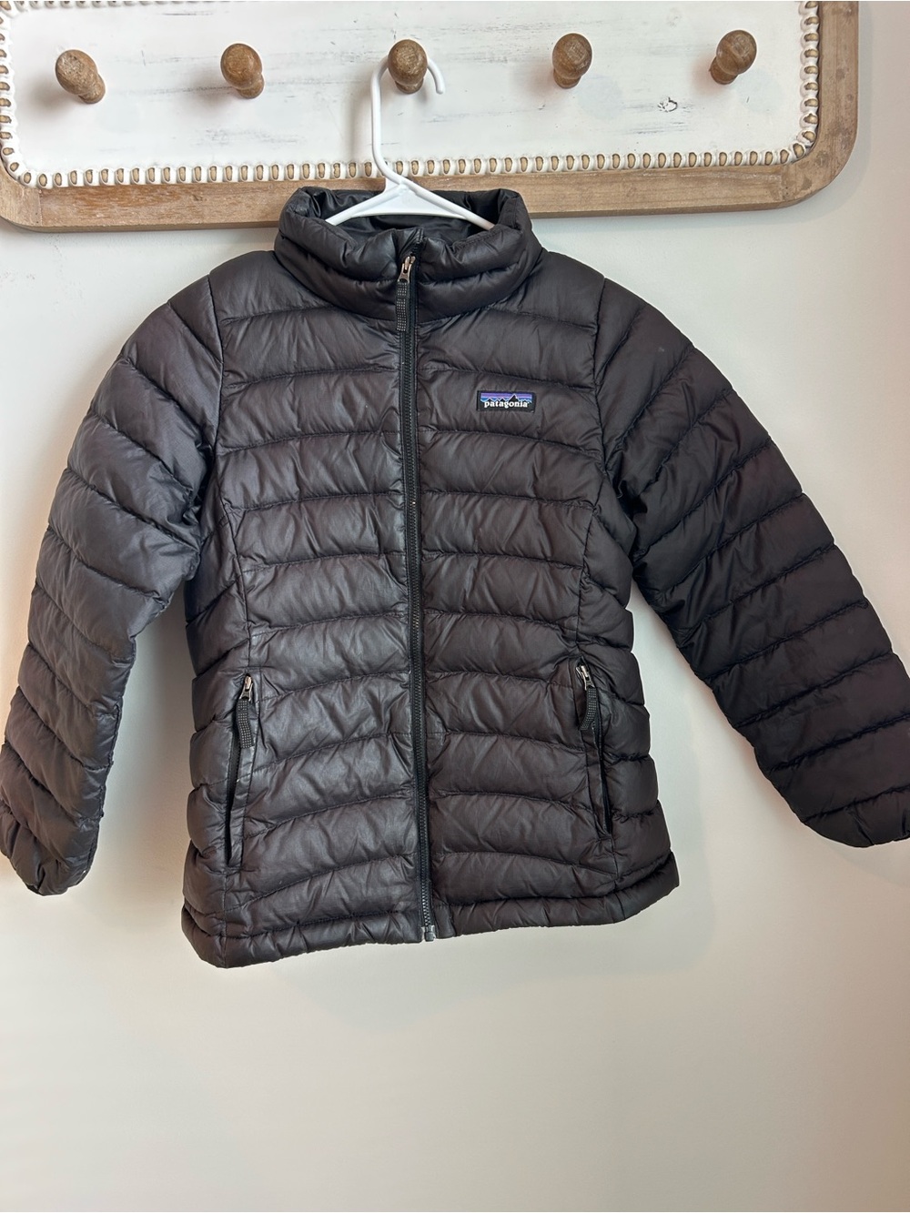 Great condition! Kids M(10). Patagonia Black Jacket with Multicolor Logo Patch